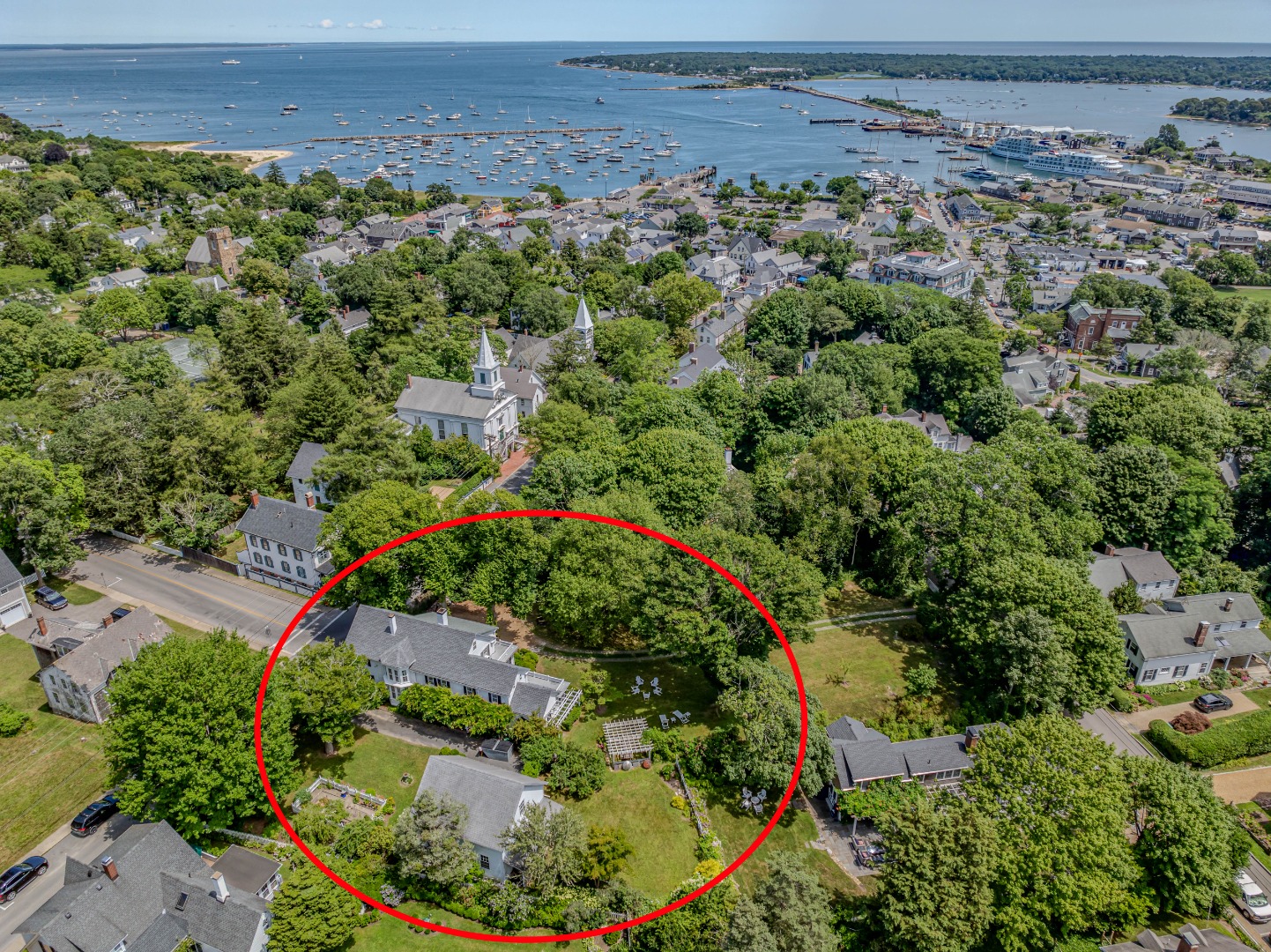 70 Spring Street Vineyard Haven, MA 02568 - Photo 64 of 68 an aerial view of a house with a yard and lake view