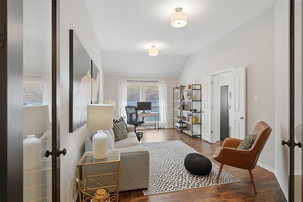 7224 Prestwick Terrace Benbrook, TX 76126 - Photo 19 of 26 a living room with furniture a rug and a table