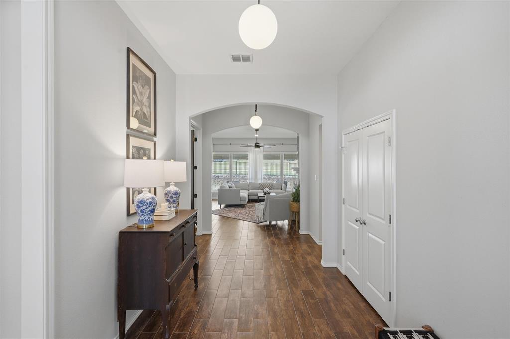 7224 Prestwick Terrace Benbrook, TX 76126 - Photo 21 of 26 a view of a livingroom with furniture and hardwood floor