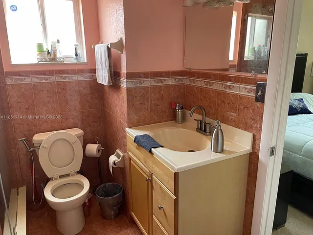 a bathroom with a sink and a toilet