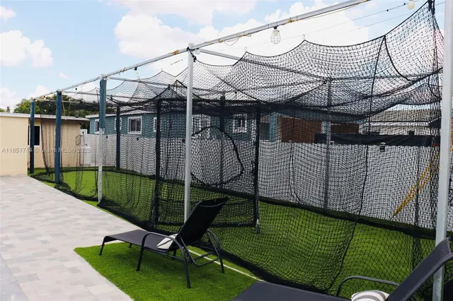 a view of a backyard with a patio
