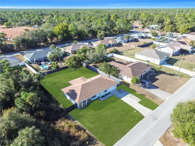 an aerial view of a house with garden