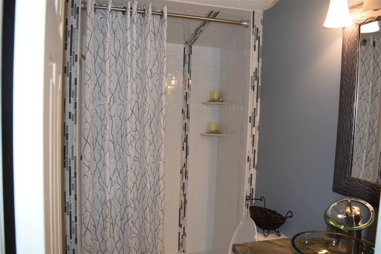 801 Sunshine Road Kenly, NC 27542 - Photo 17 of 24 Check out the accent tiles!