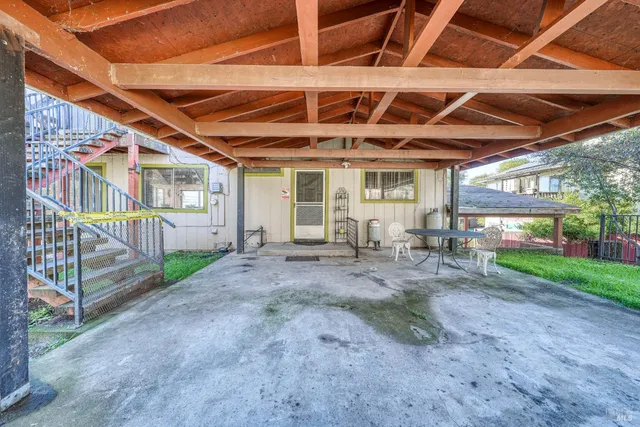 a view of backyard with green space