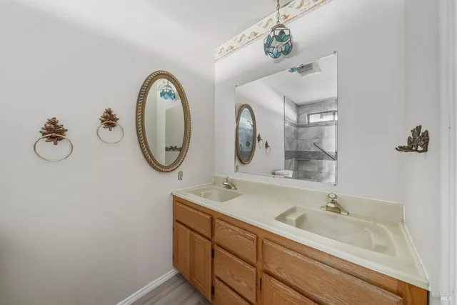 a view of a livingroom with wooden floor and closet