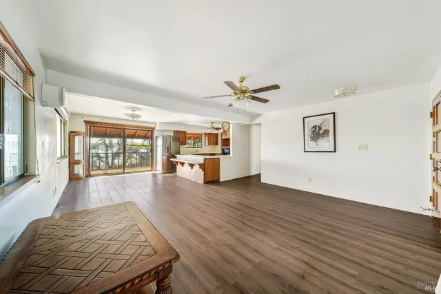 a view of empty room with wooden ceiling