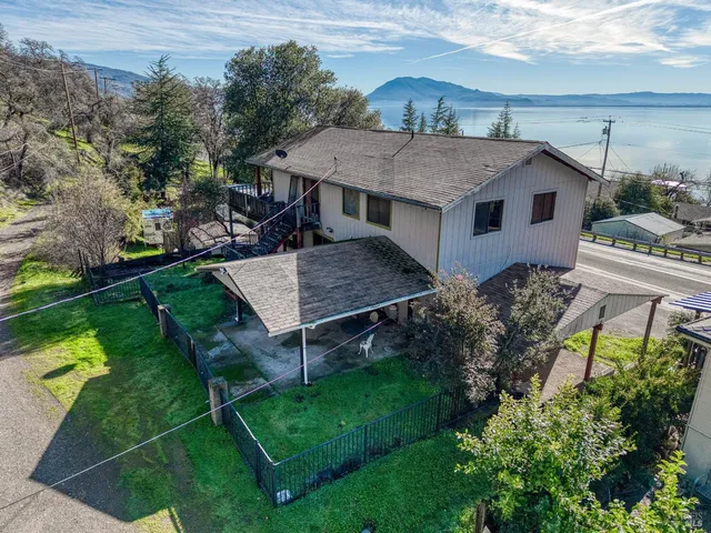 an aerial view of a house having yard