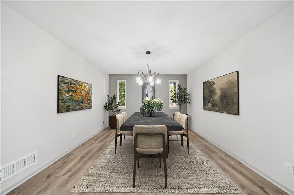 230 Lakeview Ridge East Roswell, GA 30076 - Photo 13 of 70 a dining room with furniture and window