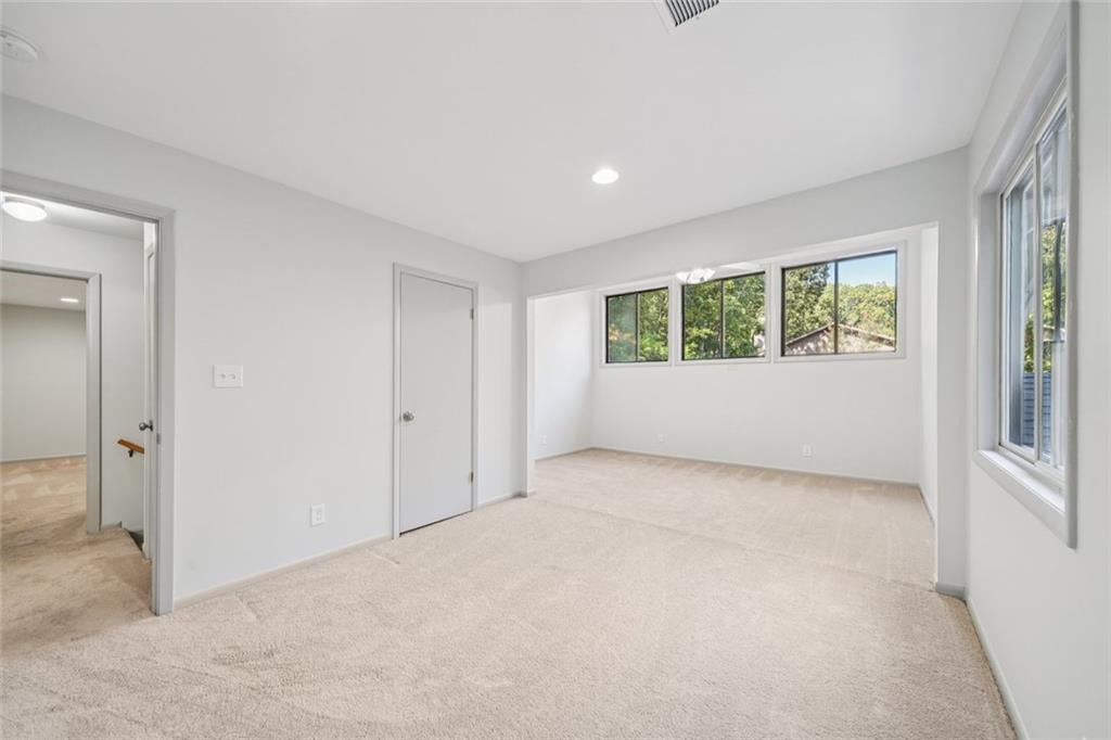 230 Lakeview Ridge East Roswell, GA 30076 - Photo 33 of 70 an empty room with windows