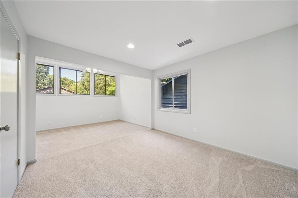 230 Lakeview Ridge East Roswell, GA 30076 - Photo 34 of 70 an empty room with windows