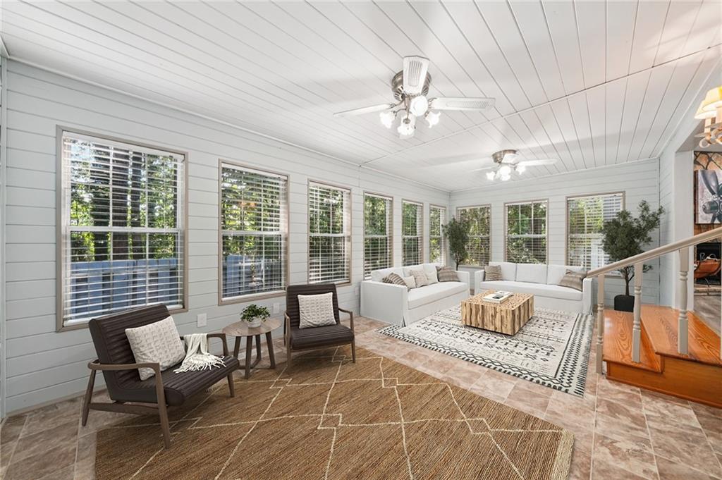 230 Lakeview Ridge East Roswell, GA 30076 - Photo 40 of 70 a living room with furniture and large windows