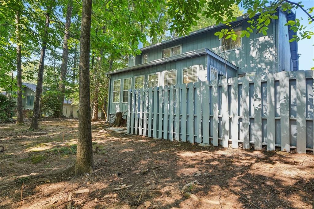230 Lakeview Ridge East Roswell, GA 30076 - Photo 45 of 70 a view of a house with backyard and trees