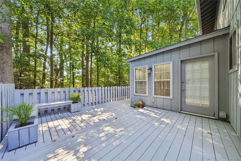 230 Lakeview Ridge East Roswell, GA 30076 - Photo 49 of 70 a view of backyard with a garden and deck