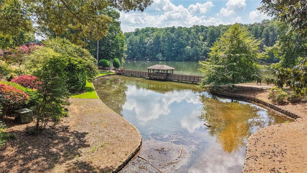 230 Lakeview Ridge East Roswell, GA 30076 - Photo 58 of 70 a view of a swimming pool with a yard