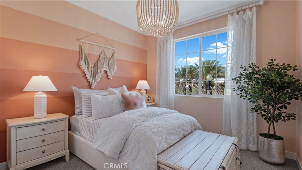 2109 Crescent Moon Upland, CA 91786 - Photo 11 of 17 a bedroom with a bed and a potted plant