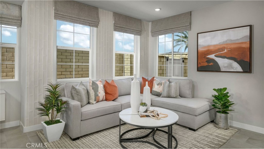 2109 Crescent Moon Upland, CA 91786 - Photo 12 of 17 a living room with furniture and a large window