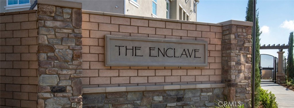 2109 Crescent Moon Upland, CA 91786 - Photo 15 of 17 a sign on the side of a building