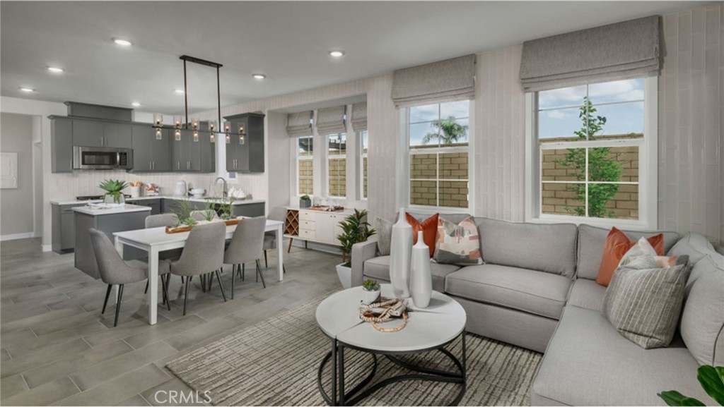 2109 Crescent Moon Upland, CA 91786 - Photo 2 of 17 a living room with furniture potted plant and a large window