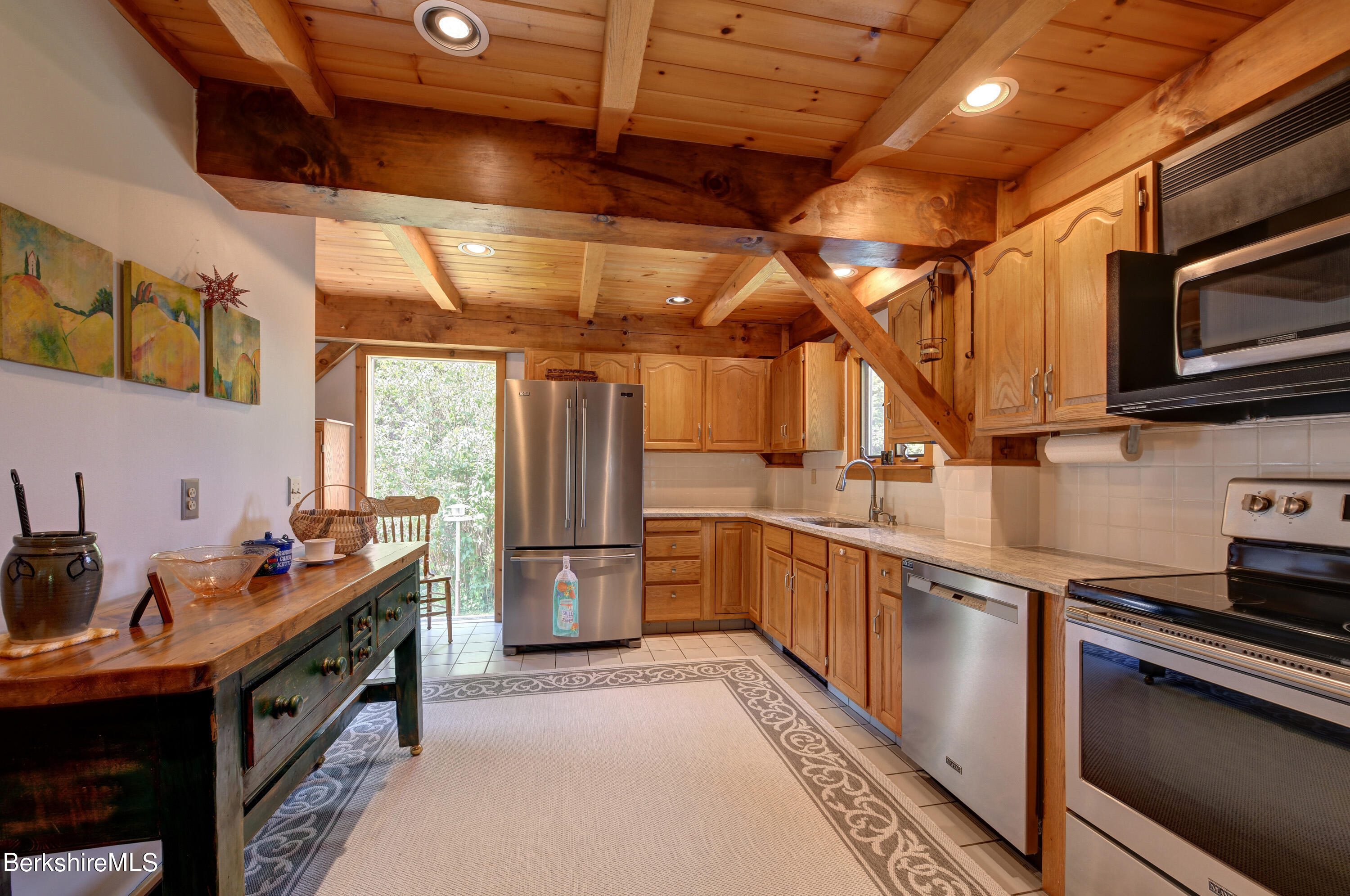 1308 Lovers Lane Road Washington, MA 01223 - Photo 14 of 49 a kitchen with stainless steel appliances granite countertop a sink and wooden cabinets