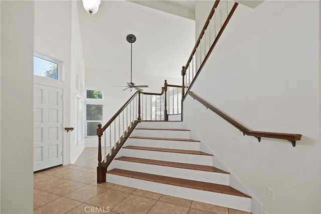 a bathroom with a double vanity sink mirror and shower