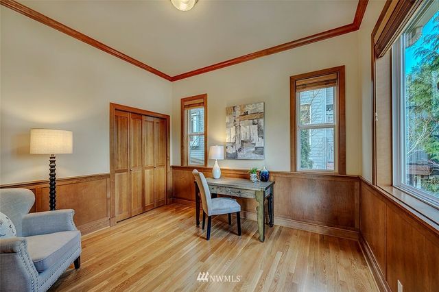 a workspace with furniture and window