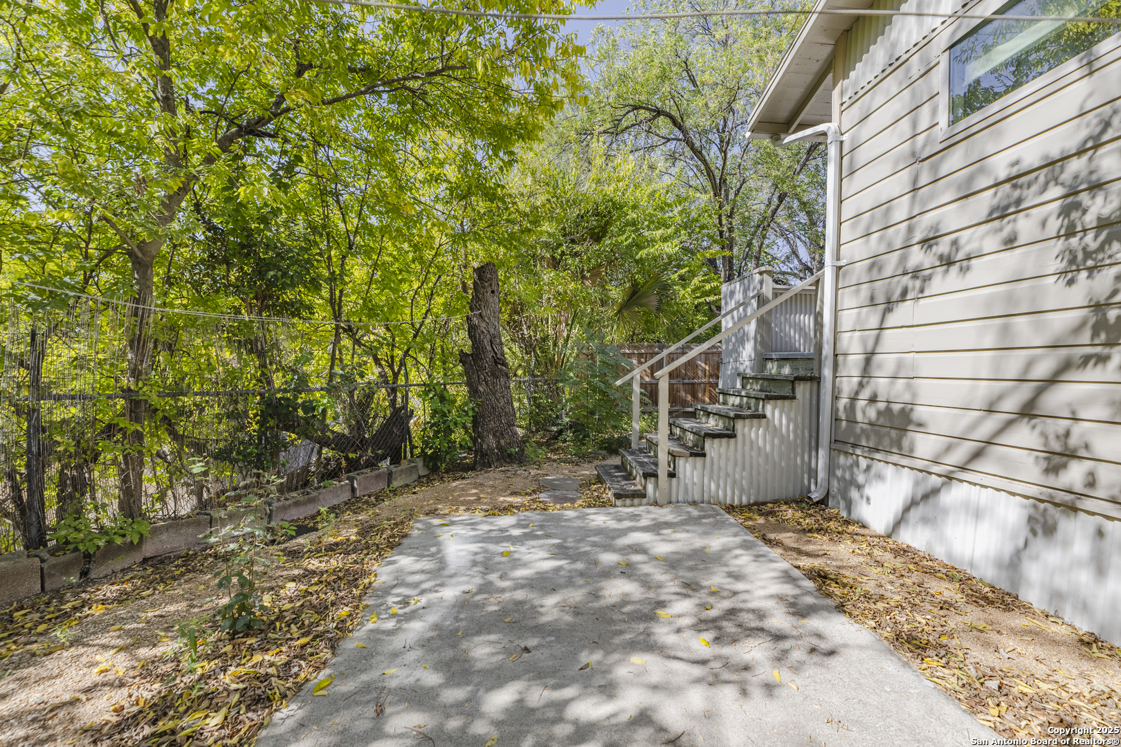 308 West Theo Avenue, Unit 2 San Antonio, TX 78214 - Photo 15 of 17 a view of a pathway with a tree