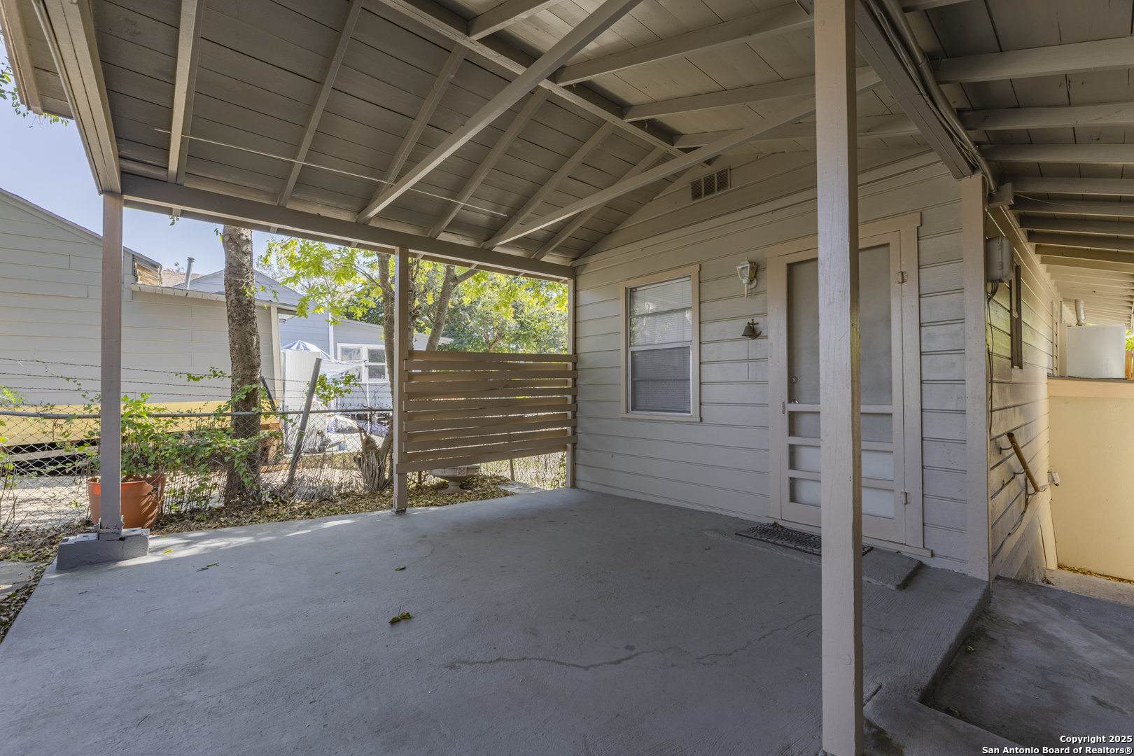 308 West Theo Avenue, Unit 2 San Antonio, TX 78214 - Photo 17 of 17 a view of an empty room with a balcony