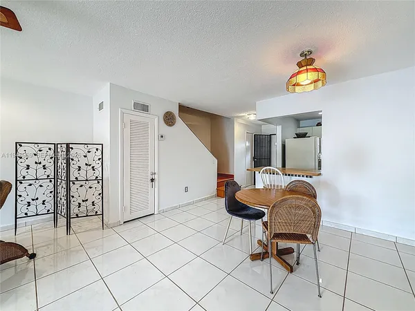 a workspace with furniture and window