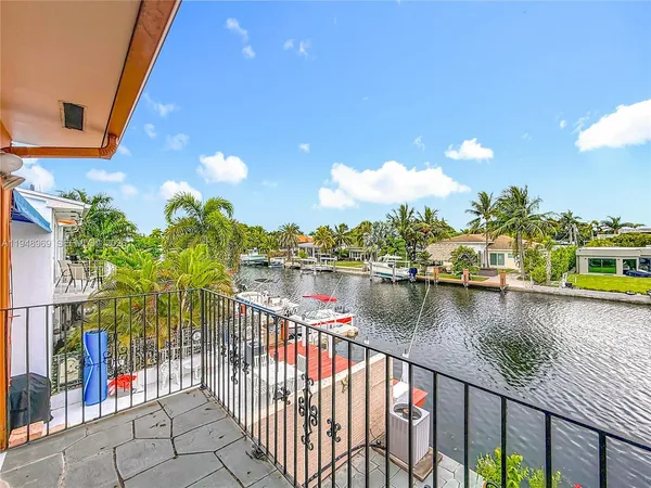 a view of a lake from a balcony