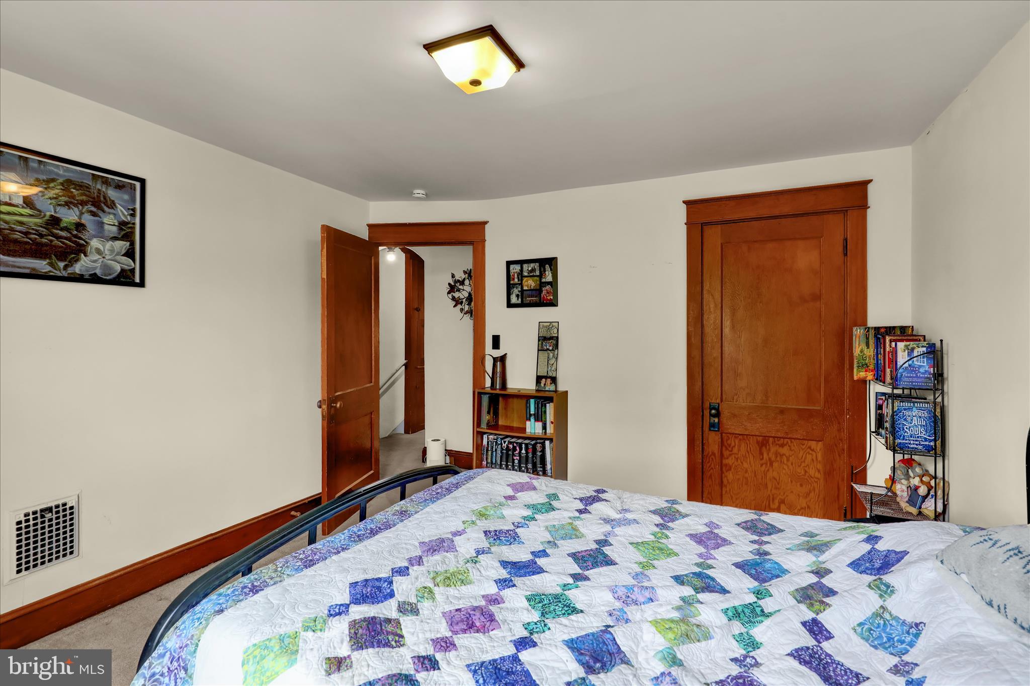 43 East Walnut Street Ephrata, PA 17522 - Photo 21 of 32 a bedroom with a bed and a dresser in it