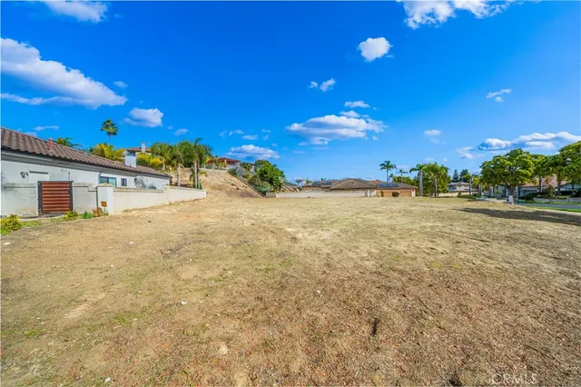 an aerial view of residential houses and outdoor space