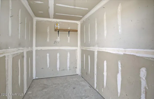 a bathroom with a shower and a mirror