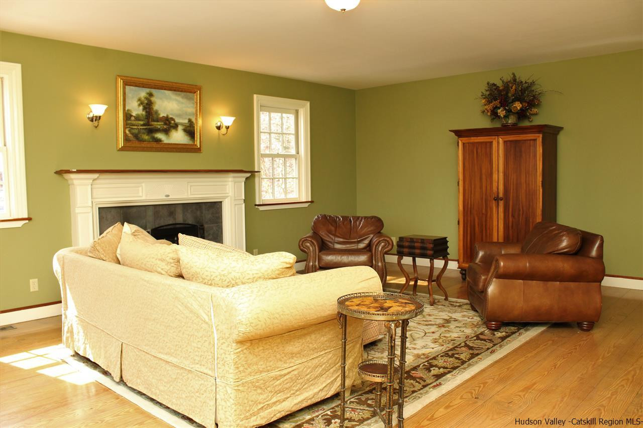 16 Peak Farm Road Stone Ridge, NY 12484 - Photo 7 of 35 a living room with furniture and a fireplace