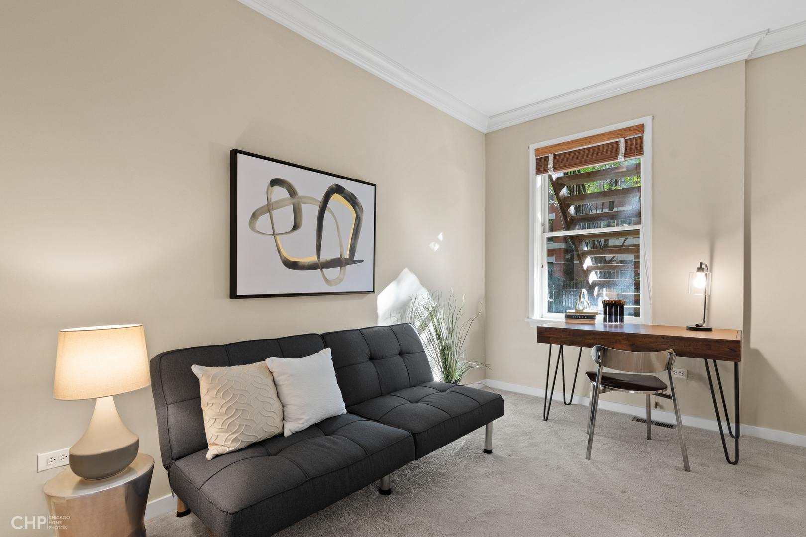 1354 West Fillmore Street, Unit A Chicago, IL 60607 - Photo 13 of 15 a living room with furniture and a window