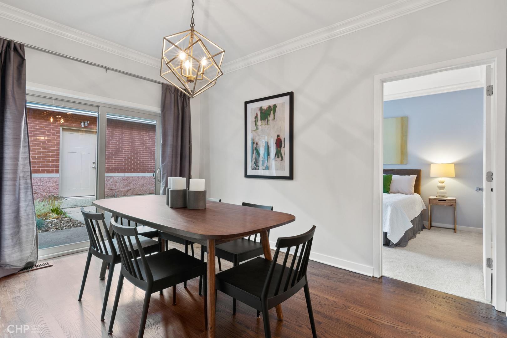1354 West Fillmore Street, Unit A Chicago, IL 60607 - Photo 8 of 15 a dining room with furniture and wooden floor