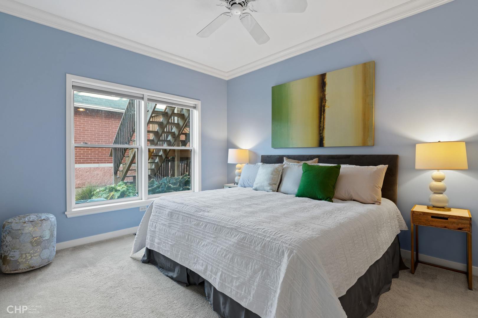 1354 West Fillmore Street, Unit A Chicago, IL 60607 - Photo 9 of 15 a bedroom with a bed and window