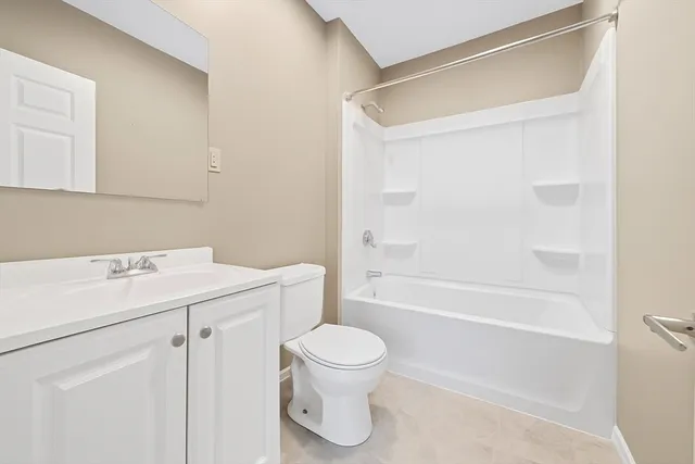 a bathroom with a sink a toilet and a bathtub