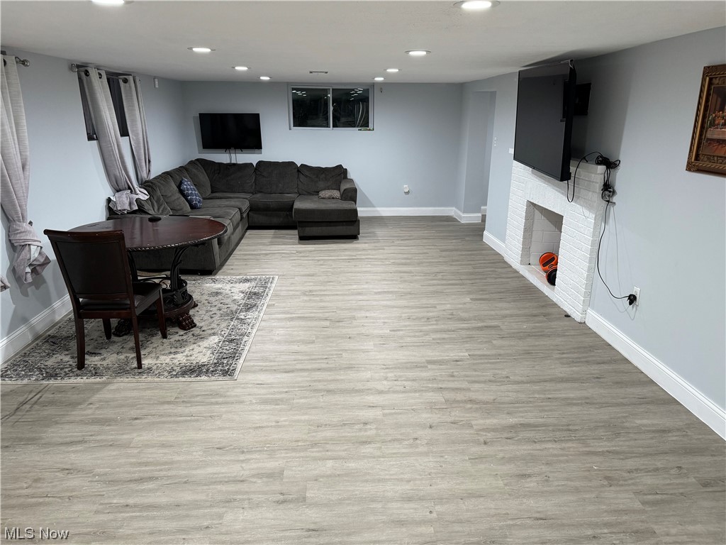 7845 Ridge Road North Royalton, OH 44133 - Photo 19 of 22 Large Sitting Area with Fireplace in Basement