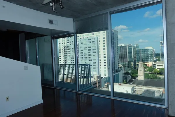 a view of a glass door and chair