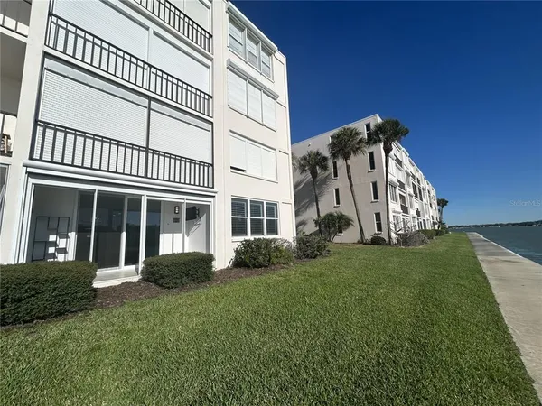 a view of swimming pool from a balcony