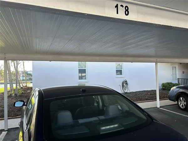 a view of a street with sitting area