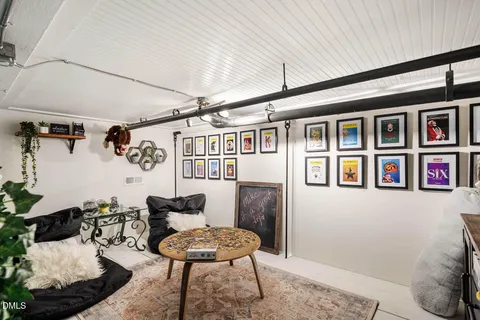 a bedroom with a bed and a table in it