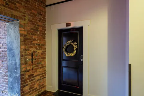 a stove top oven sitting inside of a kitchen