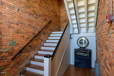 a view of a building with a yard