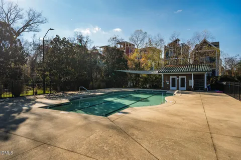 an aerial view of multiple house with outdoor space