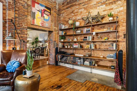 a view of a living room with furniture