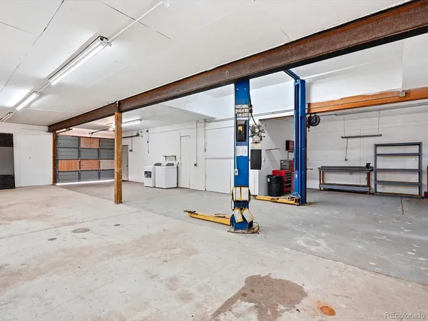 a view of a dining room with furniture and window