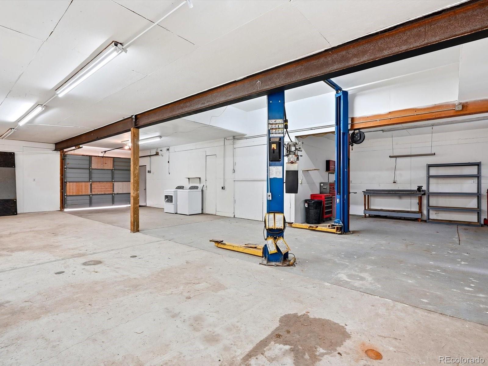 7750 East Greenland Road Franktown, CO 80116 - Photo 18 of 48 a view of a room with gym equipment