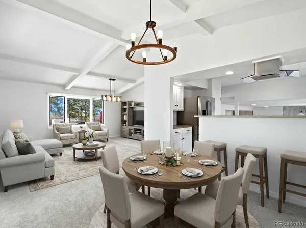 a kitchen with stainless steel appliances granite countertop a stove a sink dishwasher and a refrigerator