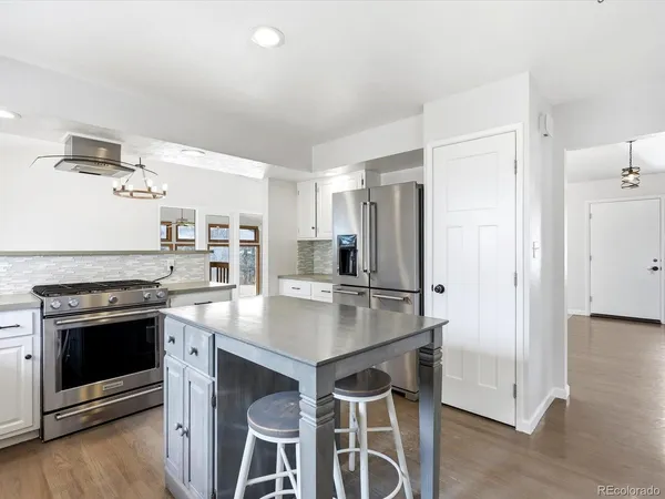 a bedroom with bed and window